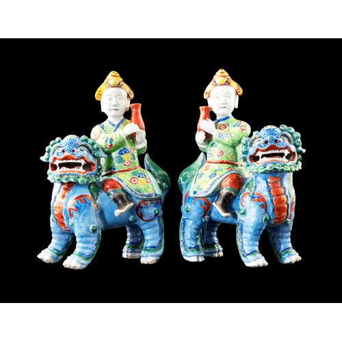Pair of Chinese export porcelain figures of riders on qilins